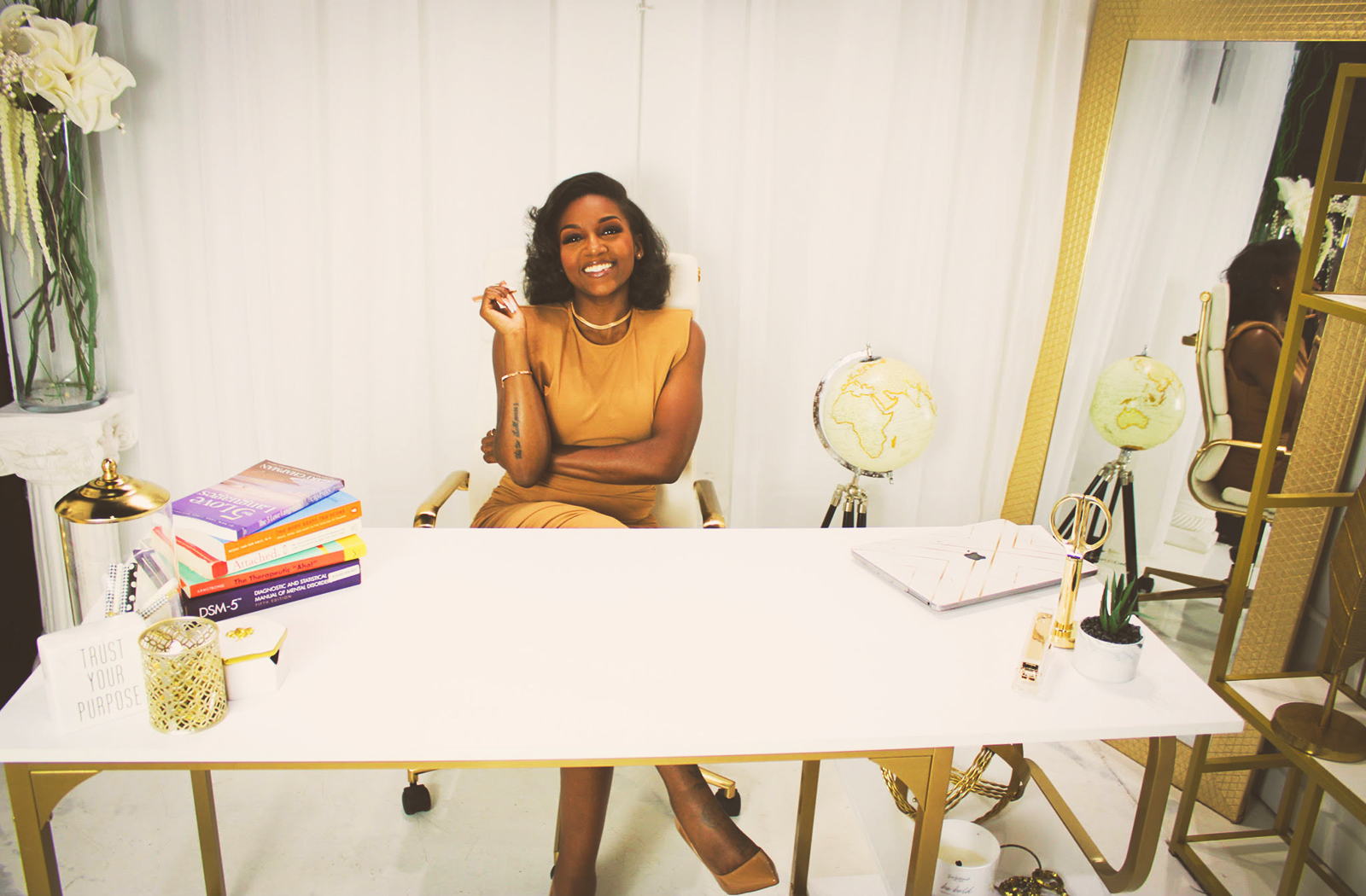 Brittany Rogers seated in a bright therapeutic office